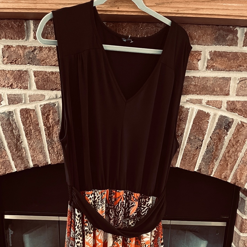 Striking 3X black and animal print asymmetrical hem dress